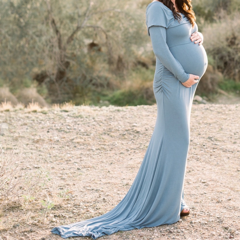 Long, blue maternity dress with train.